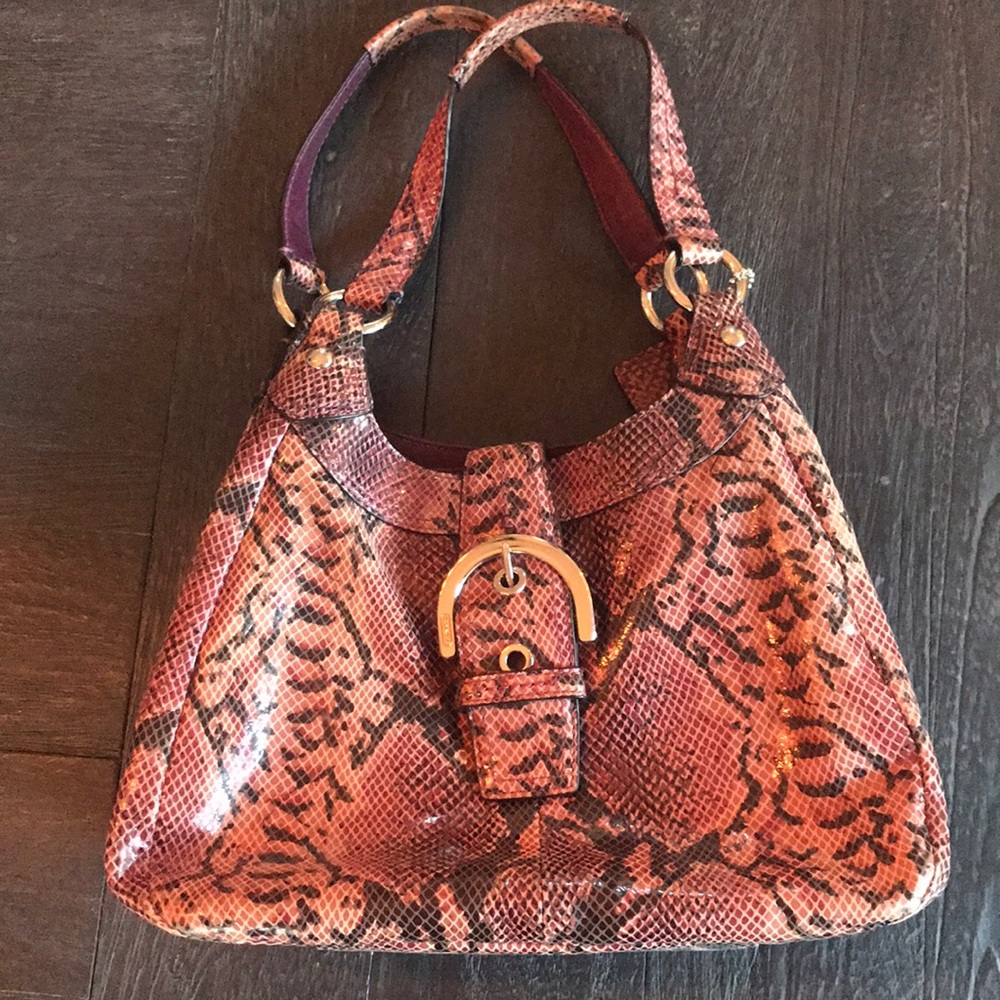 Pink and black animal print purse